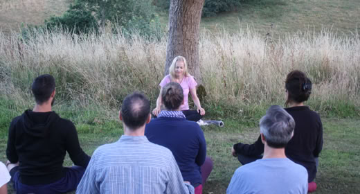 Belinda leading a meditation